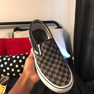 Black and grey checkered vans